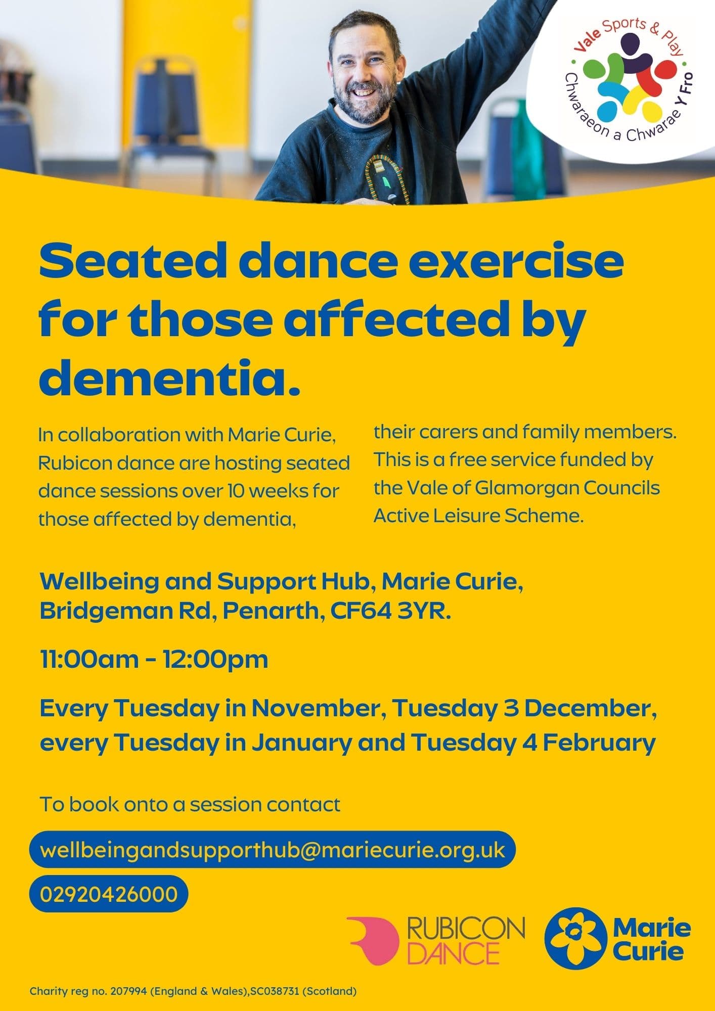 Smiling man in a blue shirt promotes seated dance exercise for dementia support with Marie Curie. - Home Instead