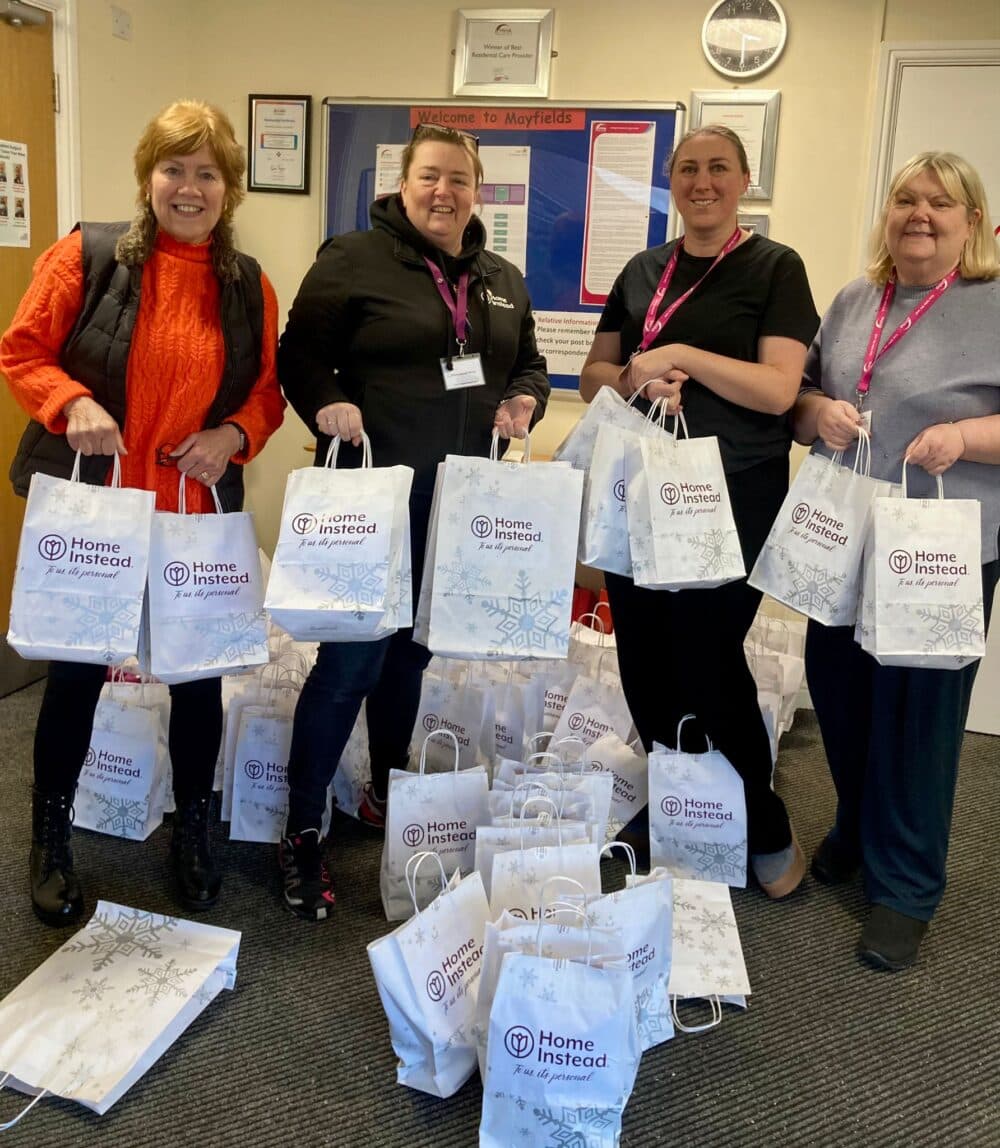 Donating gifts to Methodist Housing Association