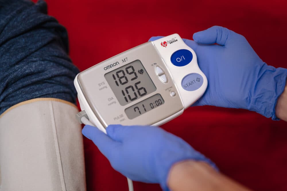 A picture of a pharmacy blood pressure monitor facilitated by Home Instead Care Professionals