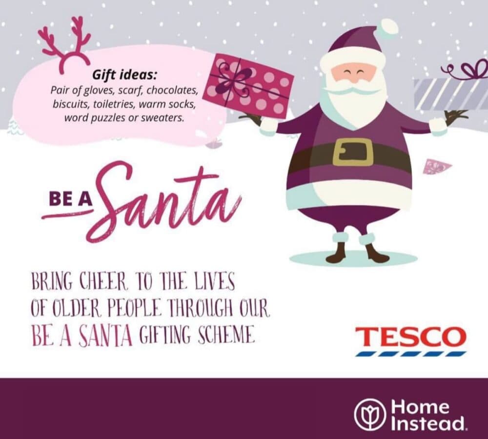 Be a Santa poster of Home Instead Dudley iin white and maroon colour with Santa Claus photo