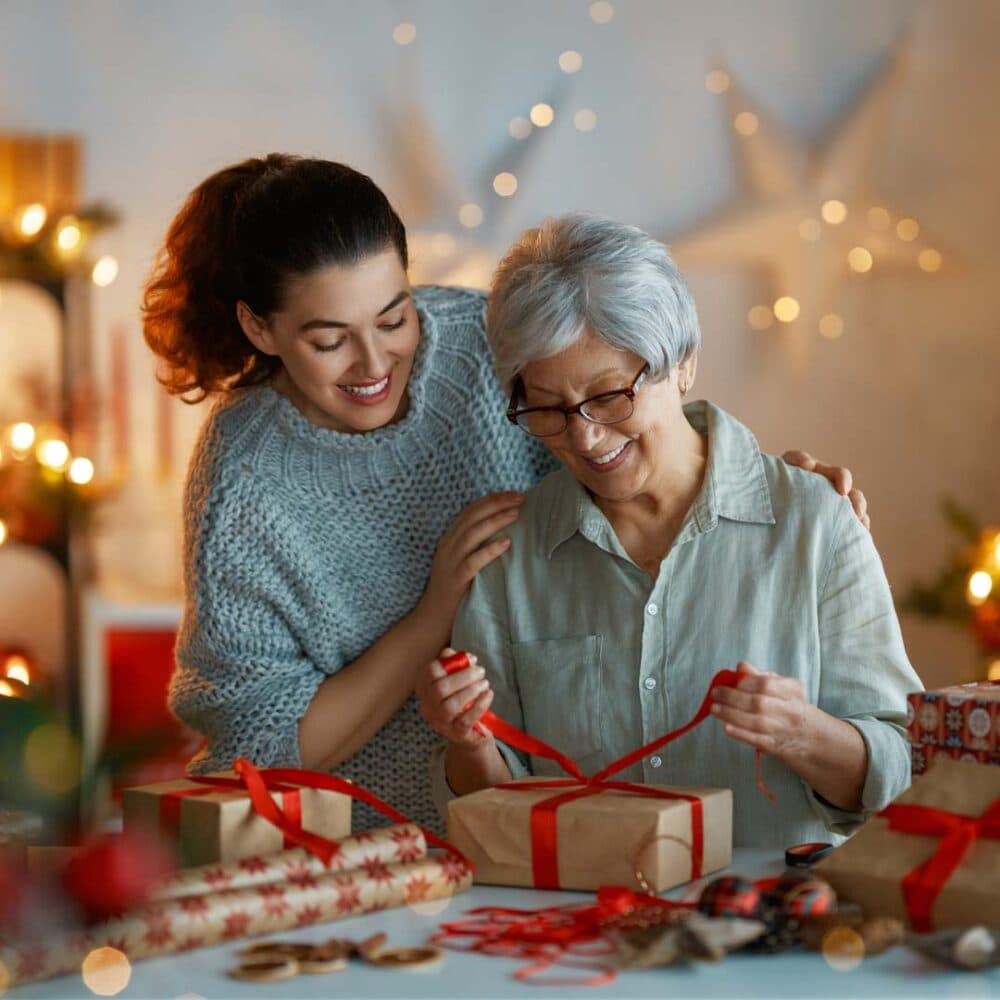 Care Professional enjoying Christmas activities with her client