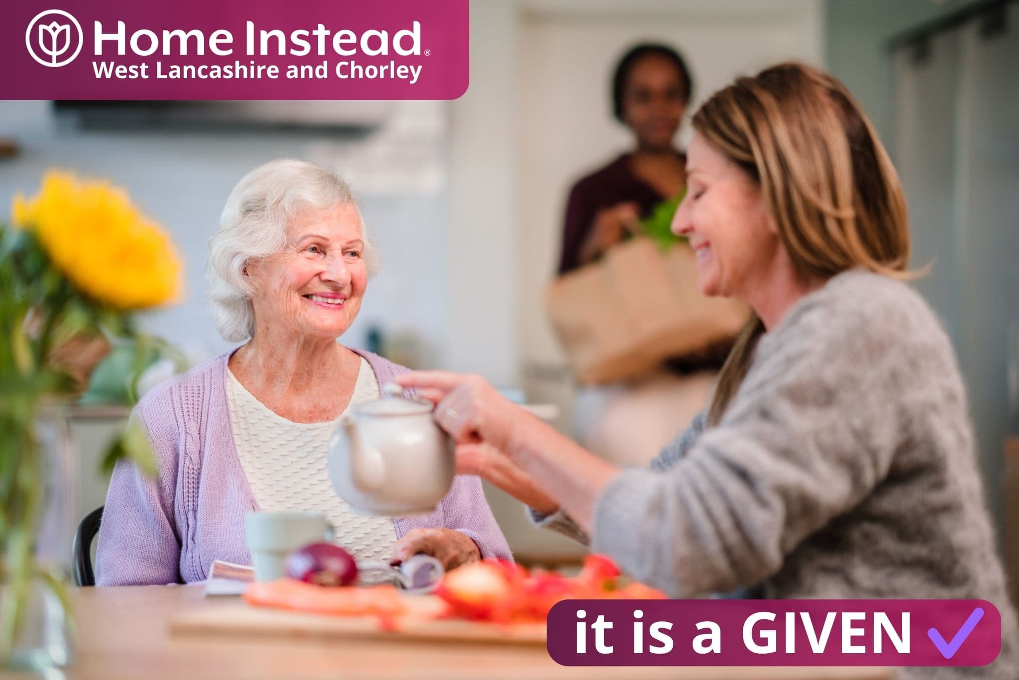 home instead west lancashire and chorley client and family member enjoying company together, in the know of having great care systems in place around them