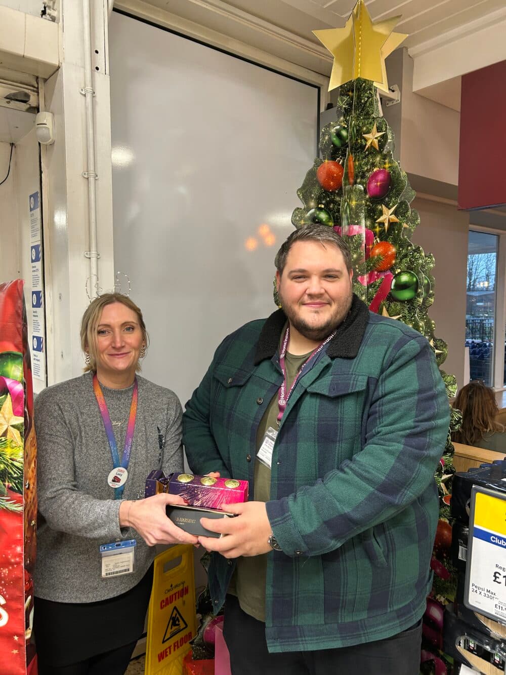 Recruiter, Tony, collecting gifts from Tesco
