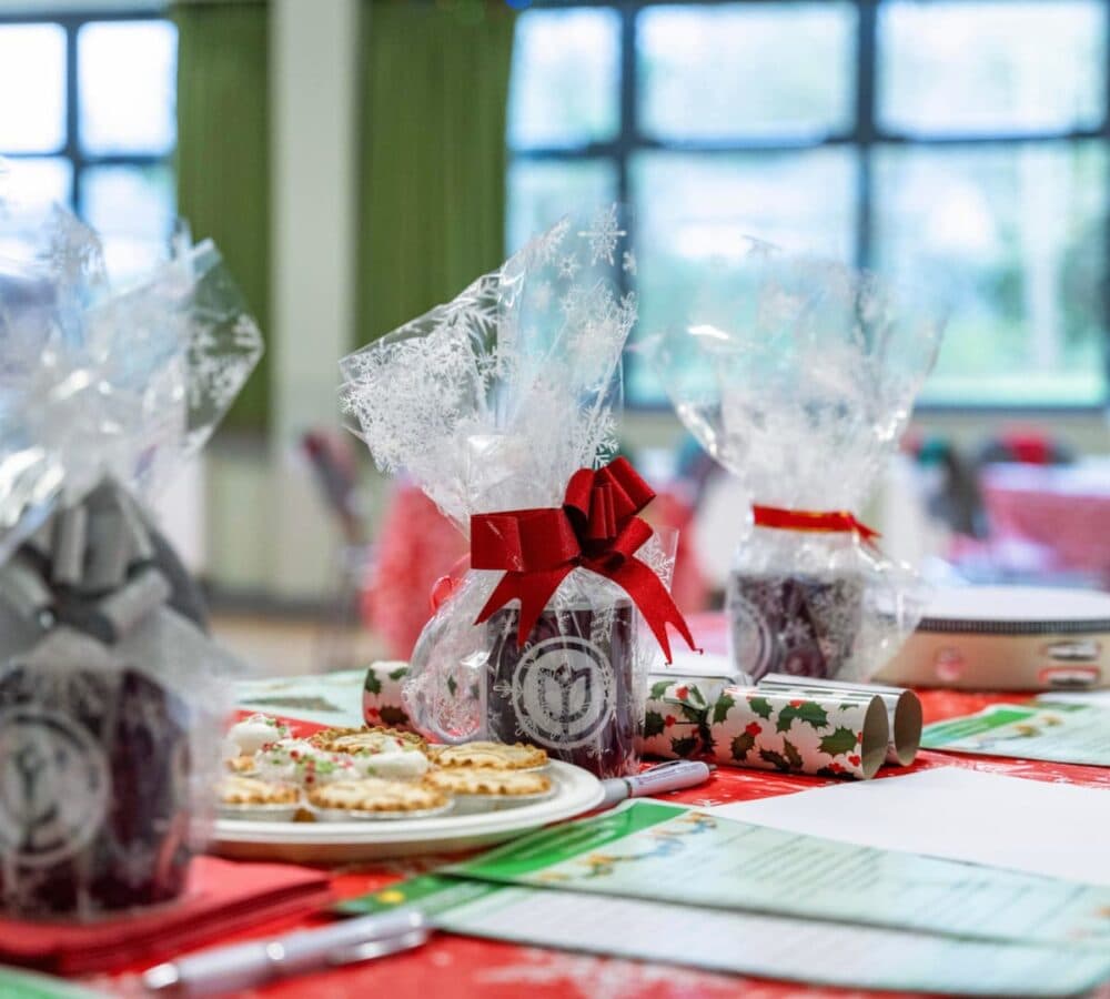 Pasties and mugs wrapped as gifts on the table