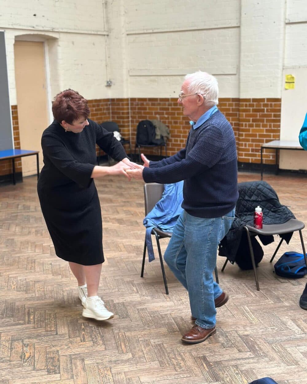 Senior citizens dancing at Singing and Movement cafe at Lark Lane Community Centre, Liverpool.