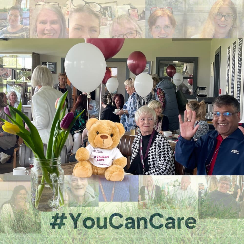 People at a cheerful indoor event with balloons, a teddy bear, and a #YouCanCare sign, smiling and waving. - Home Instead