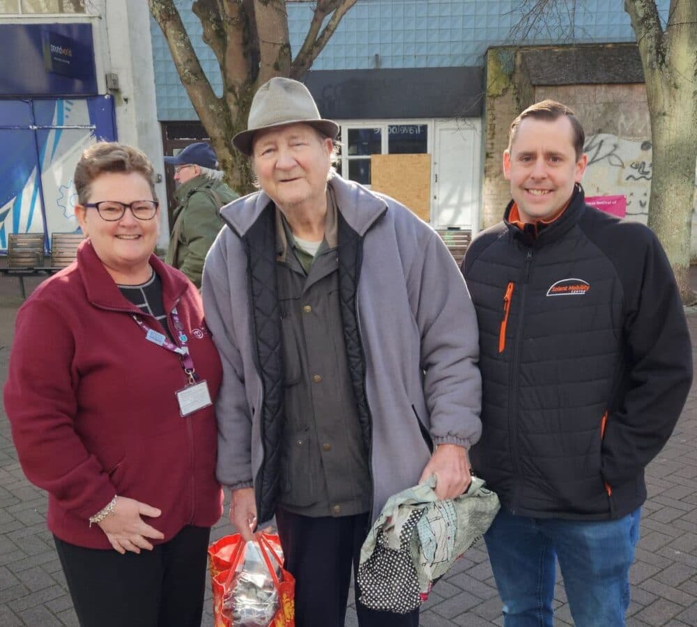 Three people happy and smiling oudoors