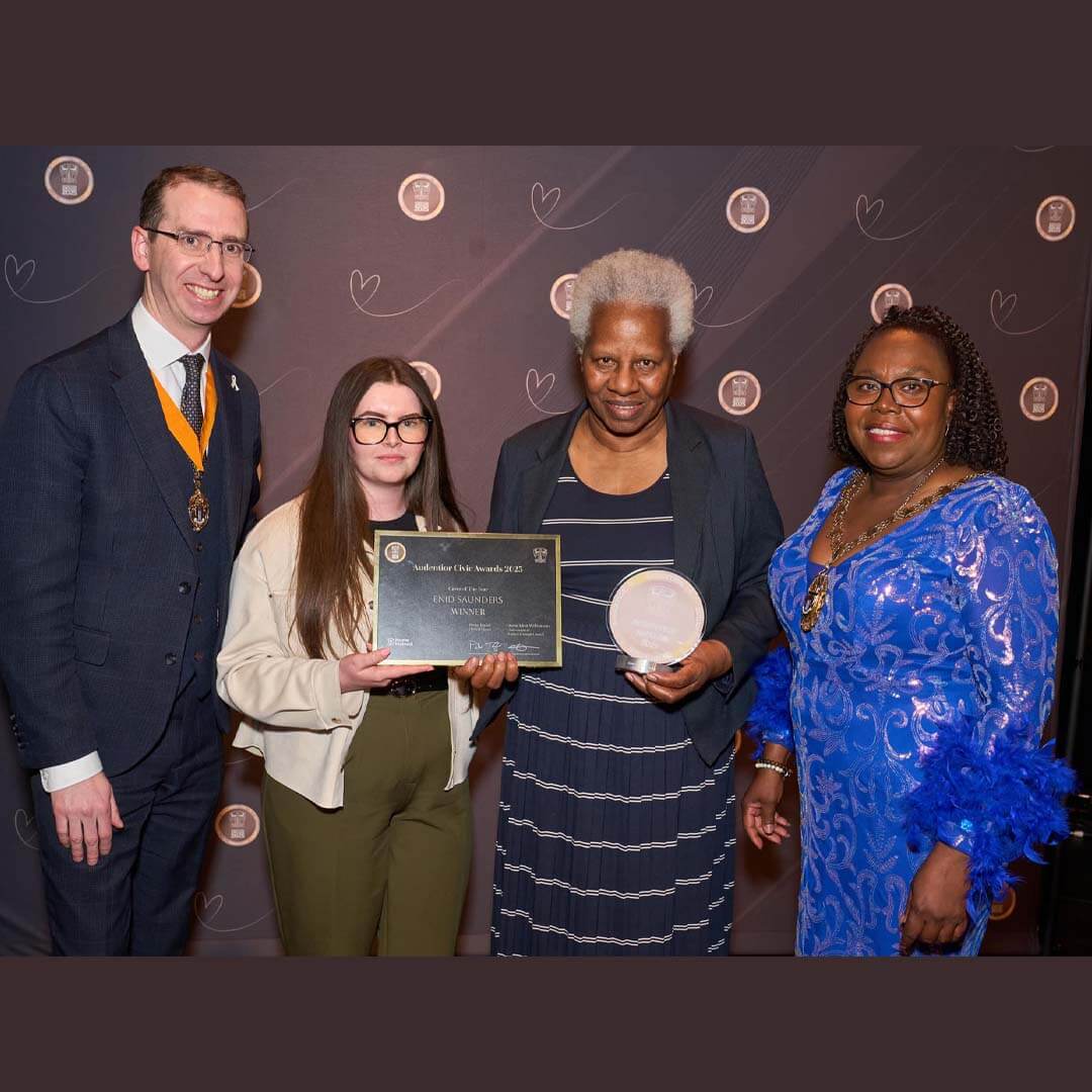 Home Instead Watford Care Manager presenting the award for carer of the year at Watford Audentior Awards 2025