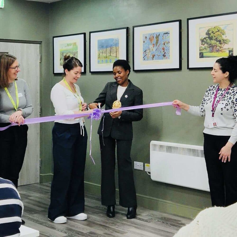 Cllr Mara Makunura cutting the ribbon to officially launch the Lavender Lounge