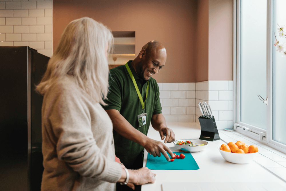 Male care pro female client food preparation - Home Instead