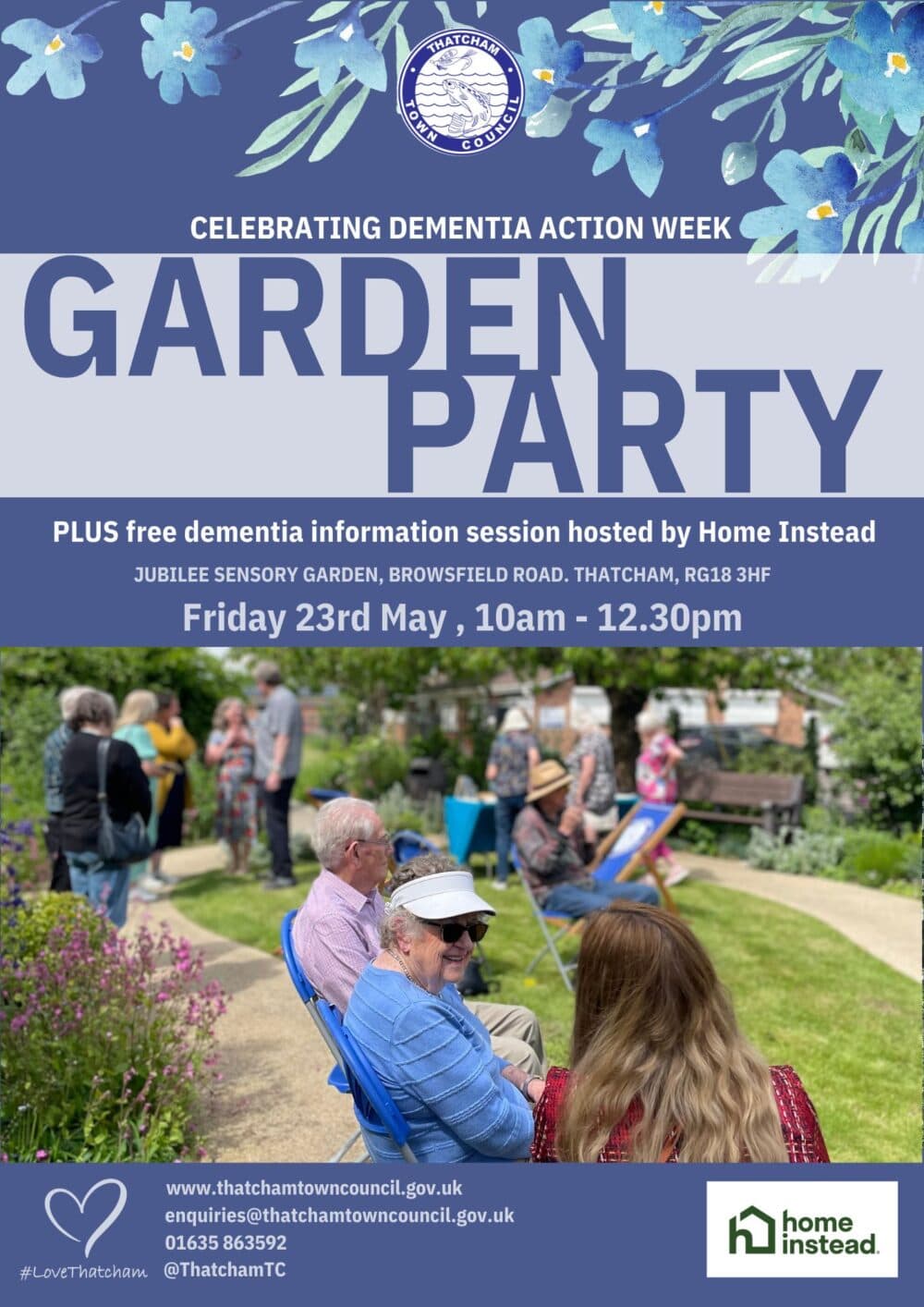 People sit and chat in a sunny garden at a community event for Dementia Action Week, with flowers in the background. - Home Instead