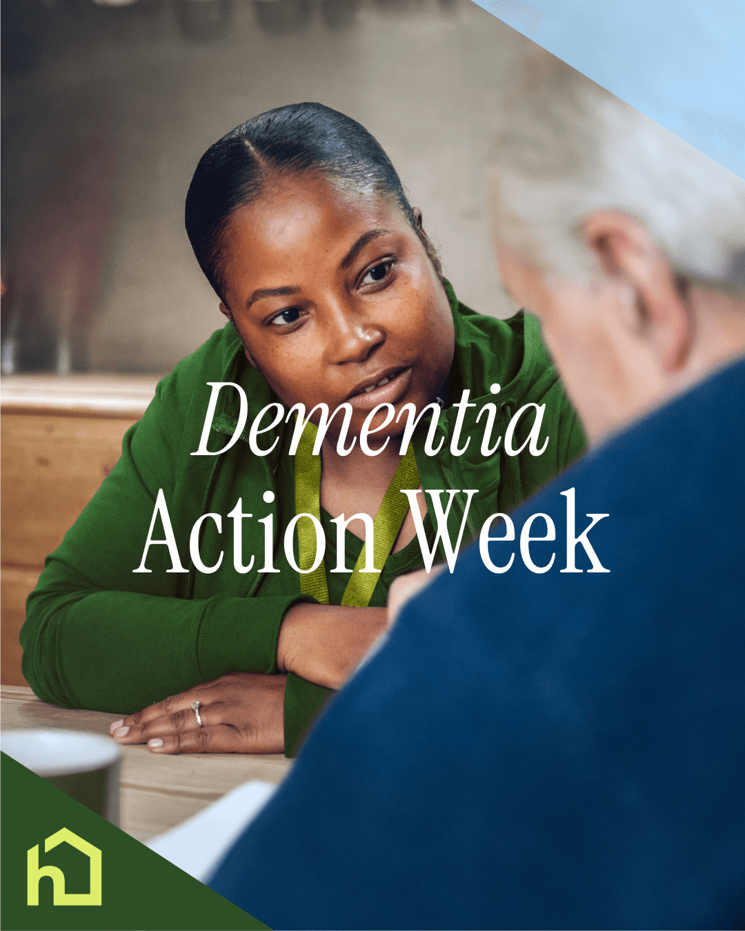 A woman talks to an older man with "Dementia Action Week" text over the image. - Home Instead