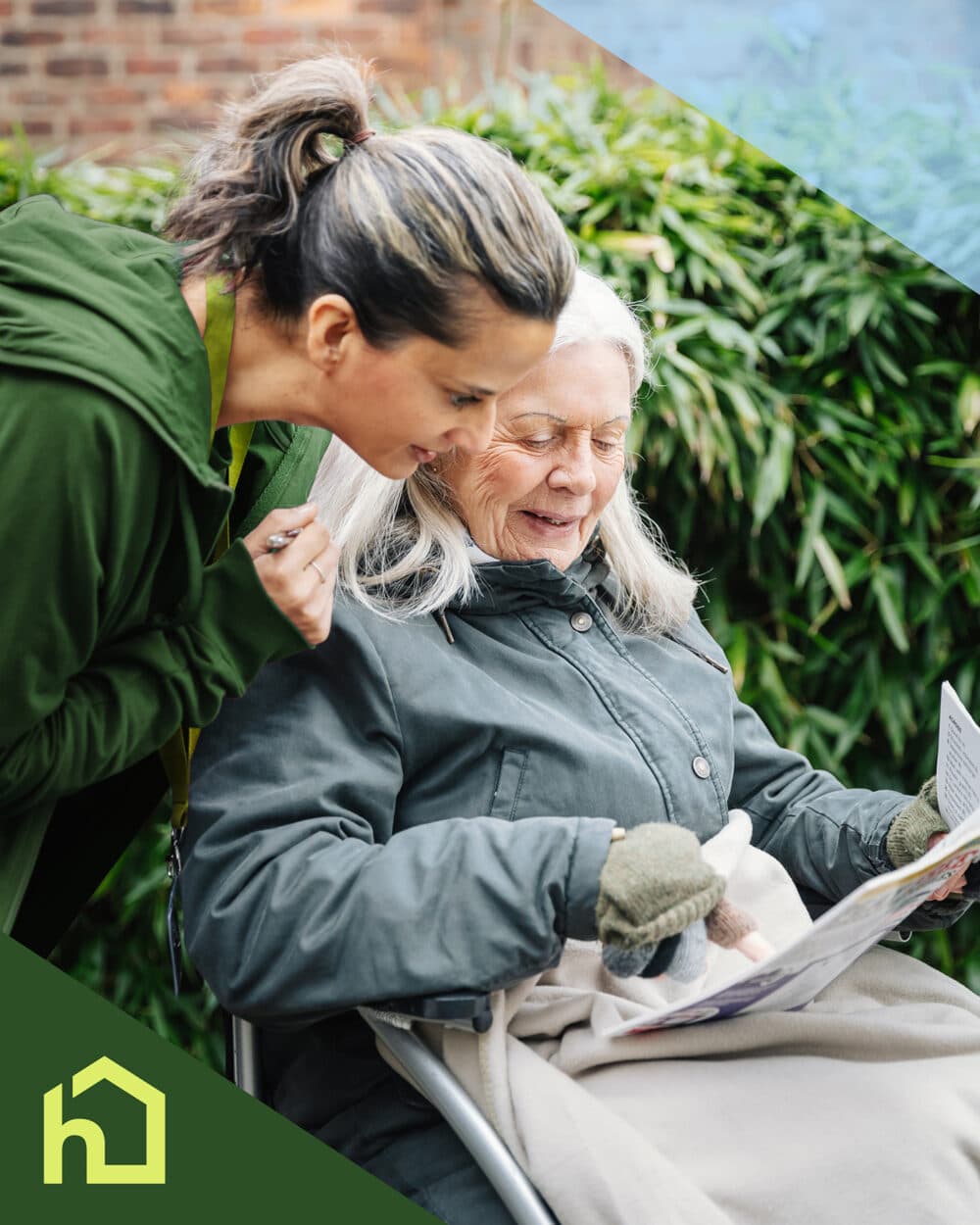 A caregiver and an elderly woman read a magazine together outside, both smiling warmly. - Home Instead