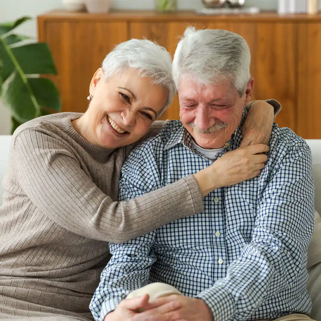 Elderly couple sitting and enjoying time together