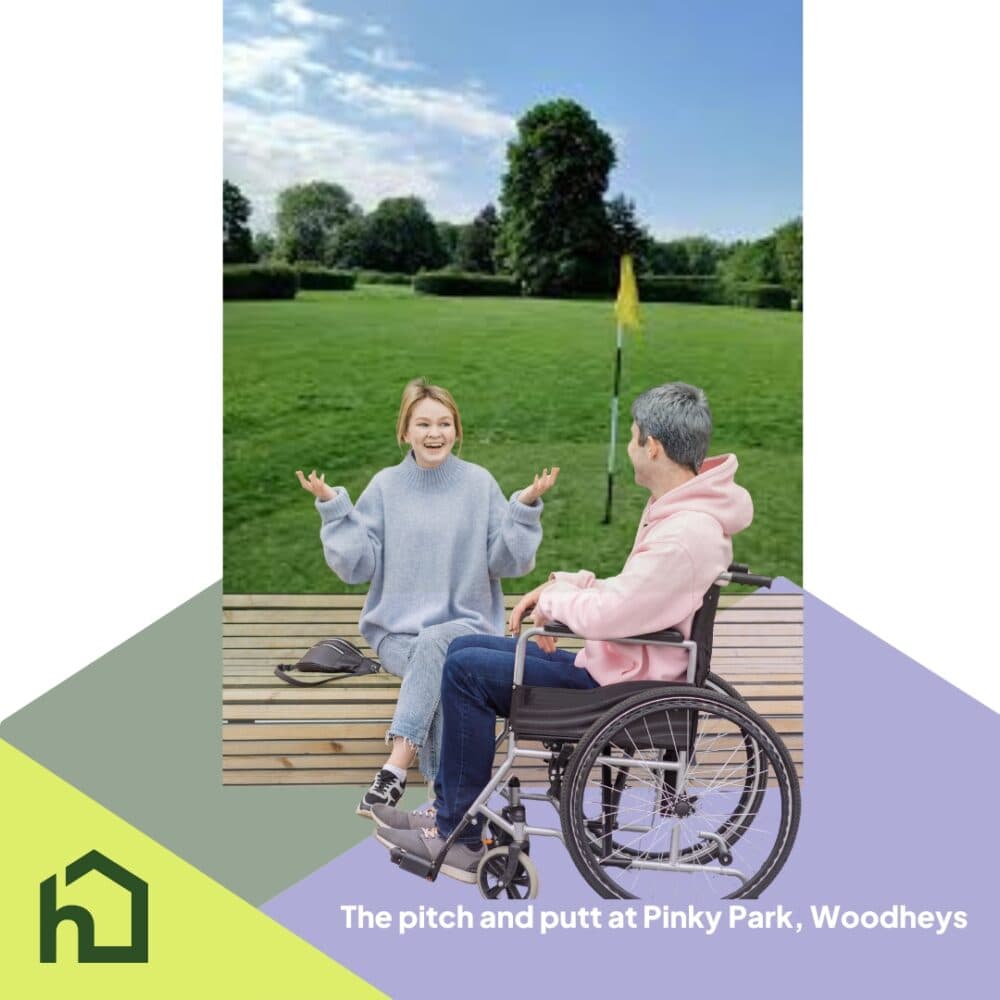 Two people, one in a wheelchair, talking near a golf flag on a grassy pitch and putt course at a park. - Home Instead