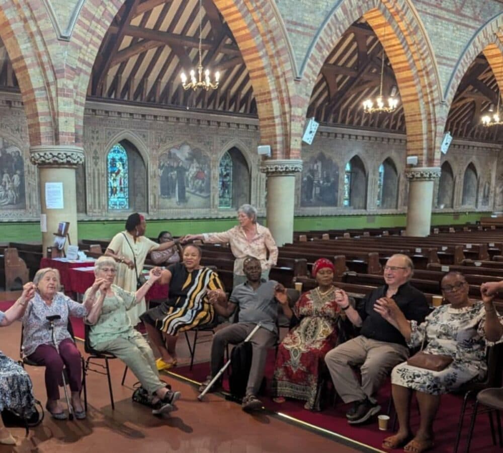 Group of older adults happy and singing