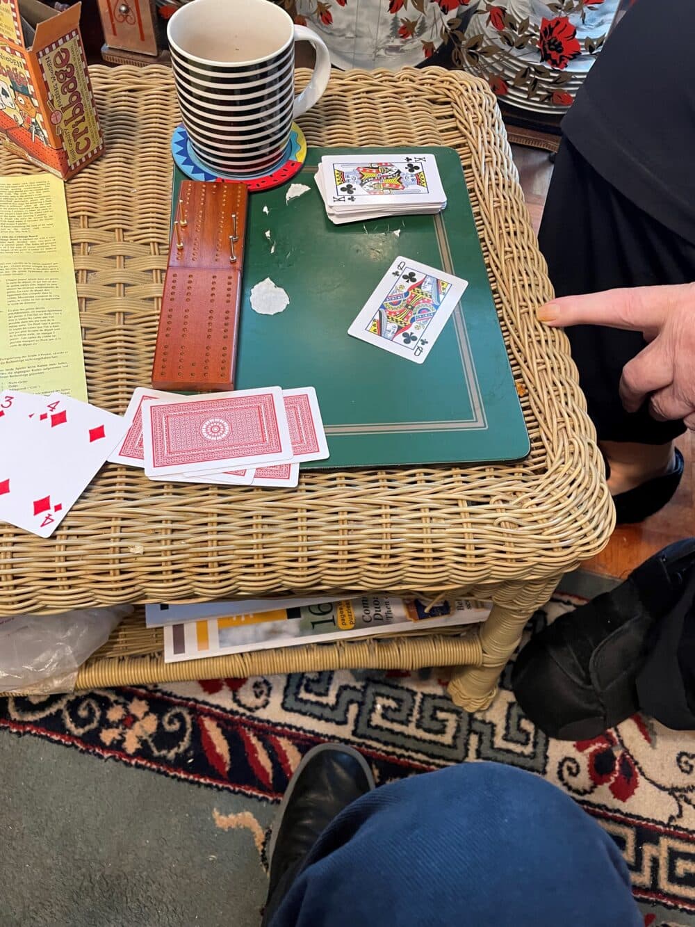 carer playing cards with a dementia client
