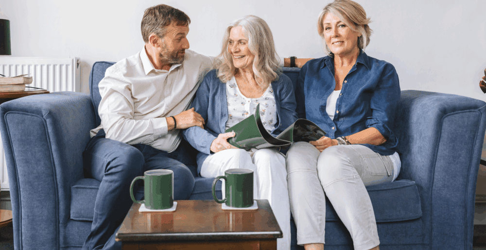 Family happy on sofa - Home Instead