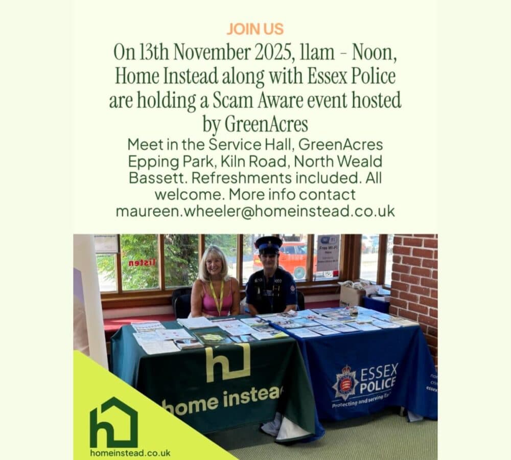 Maureen at the event with a table in front of her and some flyers