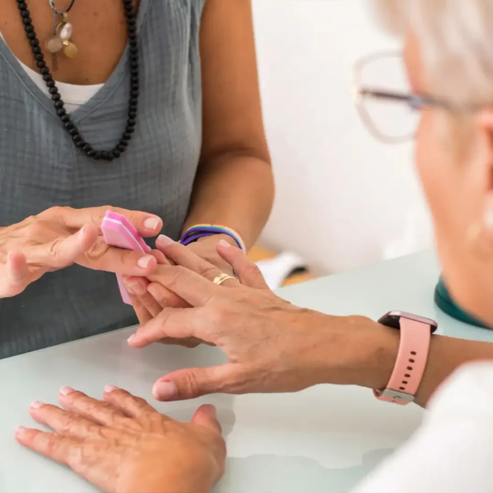 Older lady enjoying a nail care pamper session