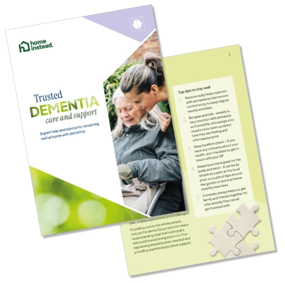 Cover and inside page of a dementia care guidebook, featuring two women and a puzzle piece graphic. - Home Instead