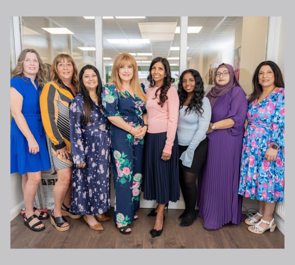 Group of ladies happy and smiling inside the office