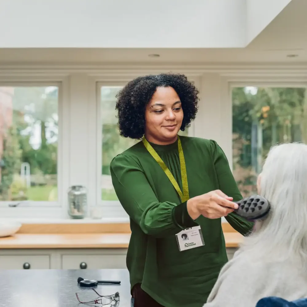 Home Instead Care Professional supporting client