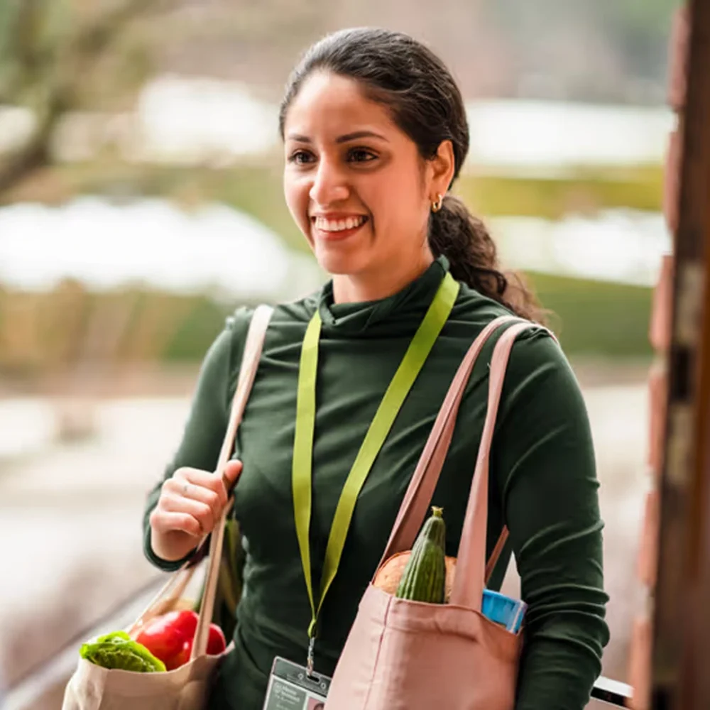 Home Instead care professional supporting with shopping