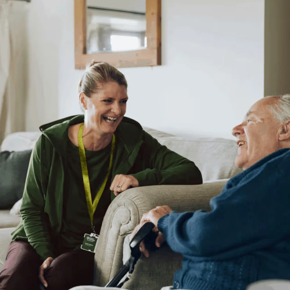 Home Instead Care Professional chatting with client