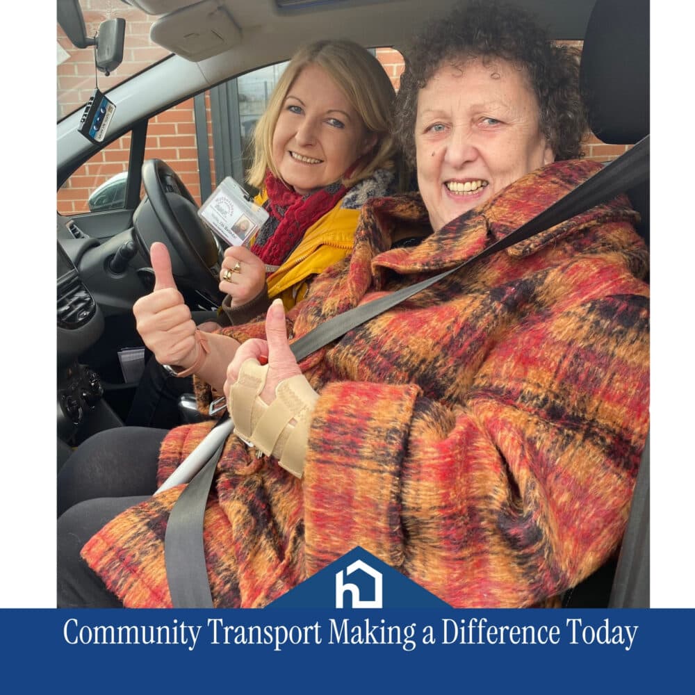 Two smiling women in a car, both giving thumbs up, with "Community Transport Making a Difference Today" text below. - Home Instead
