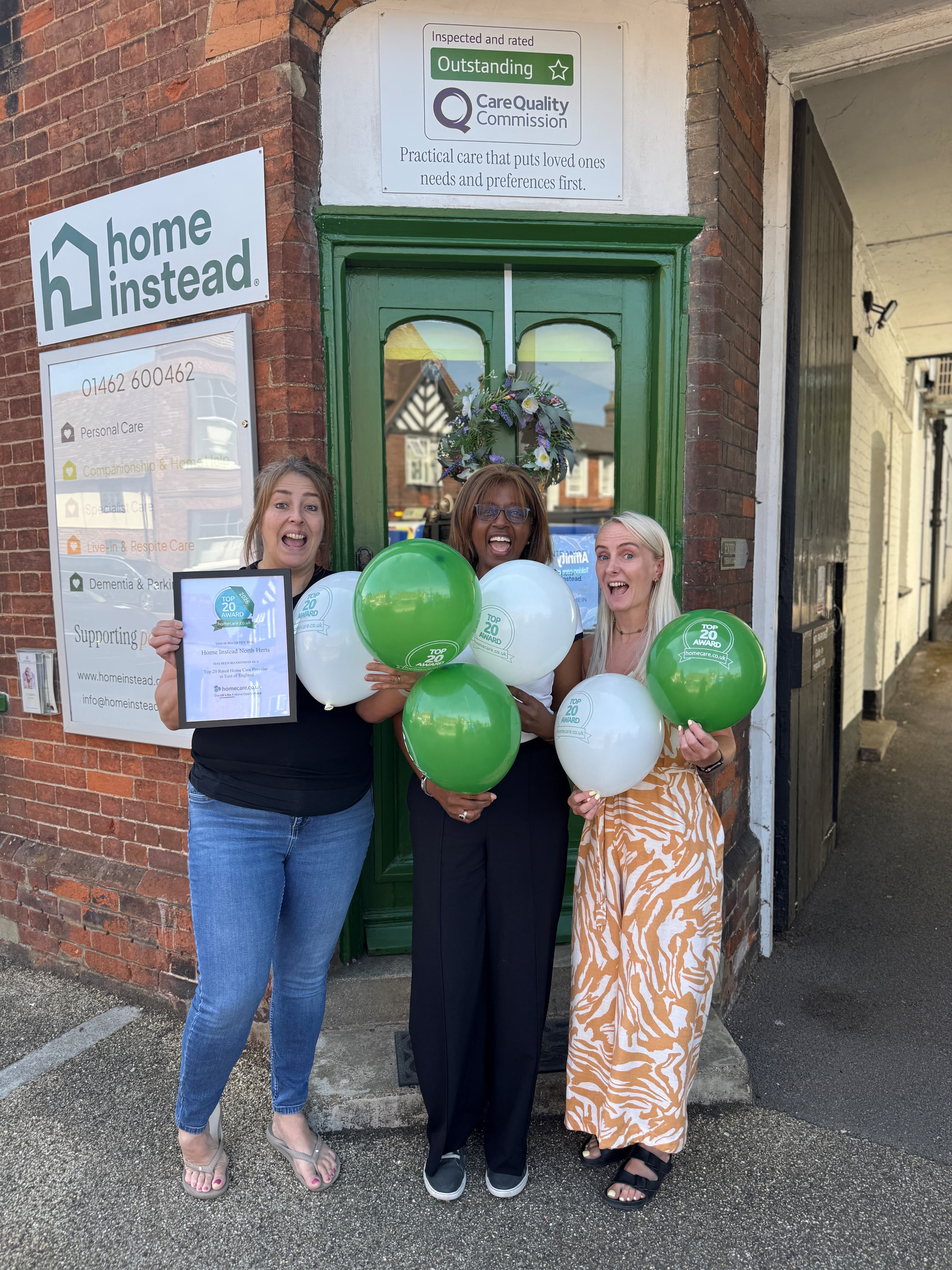 Members of the Home Instead North Herts team proudly celebrating their homecare.co.uk Top 20 Home Care Award 2026 recognition.