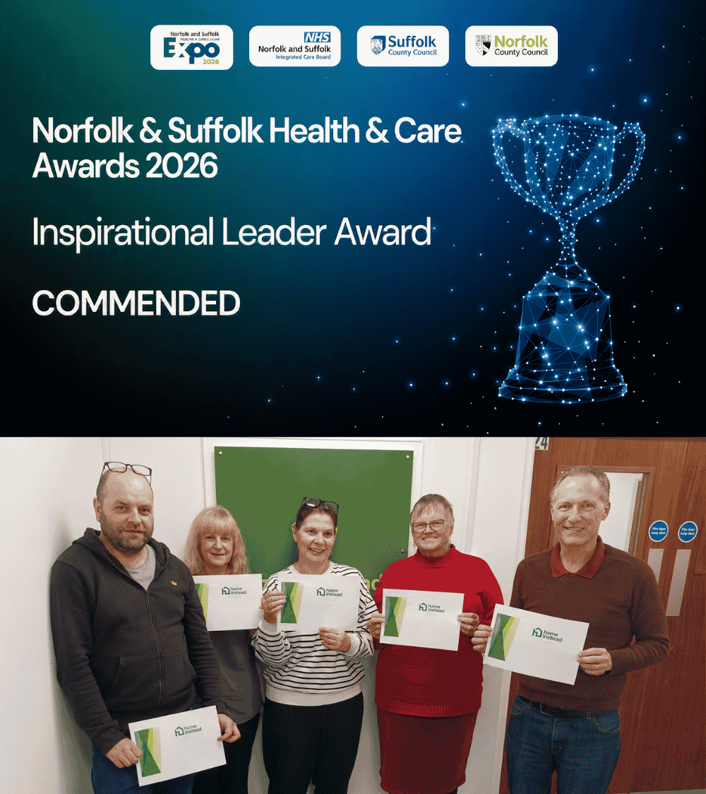Five people stand indoors holding certificates beneath a banner for the Norfolk & Suffolk Health & Care Awards. - Home Instead