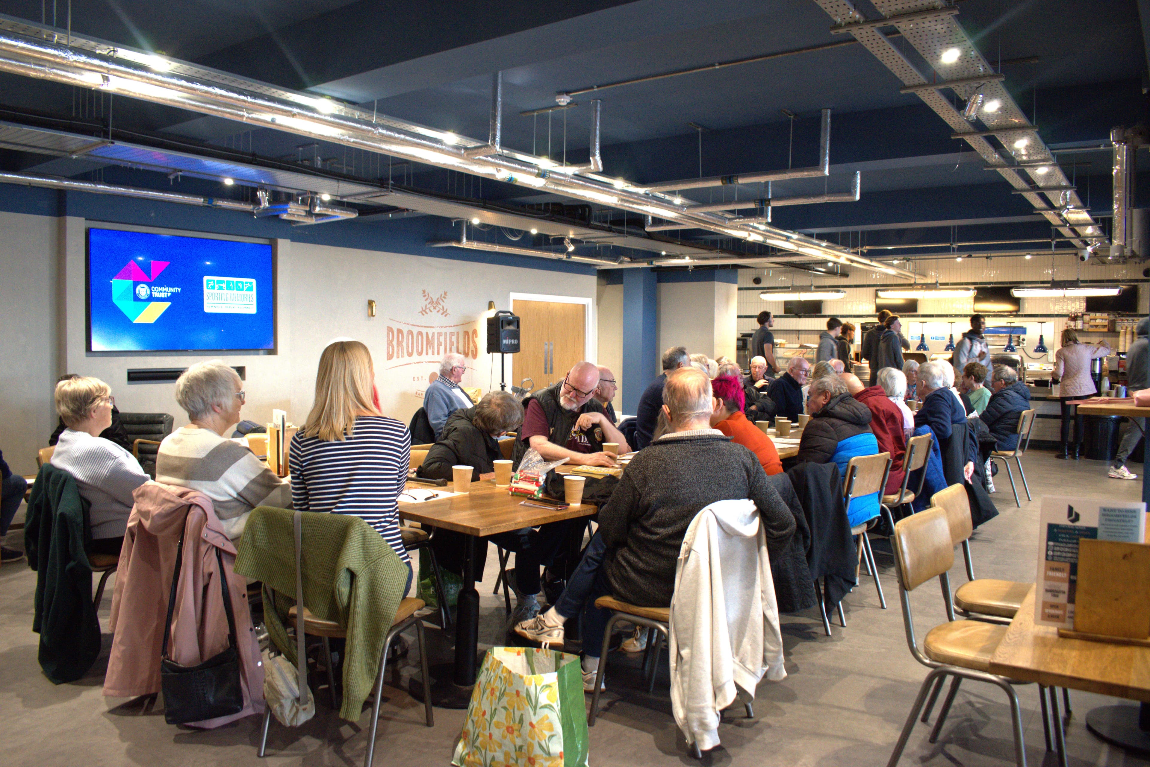 Home Instead Bromley proudly sponsors Sporting Memories at Bromley FC alongside Bromley Borough Rotary Club, helping older adults stay connected through friendship, conversation and shared memories.