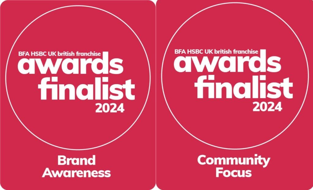 Two red panels: "awards finalist 2024," one for Brand Awareness, one for Community Focus. - Home Instead