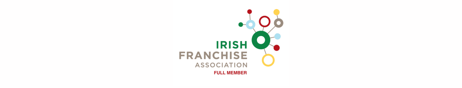 Irish Franchise Association logo with colourful interconnected circles and the text "FULL MEMBER" below. - Home Instead