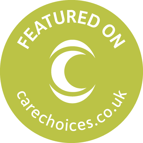 Green circular badge with "Featured on carechoices.co.uk" and a stylised white crescent logo in the centre. - Home Instead