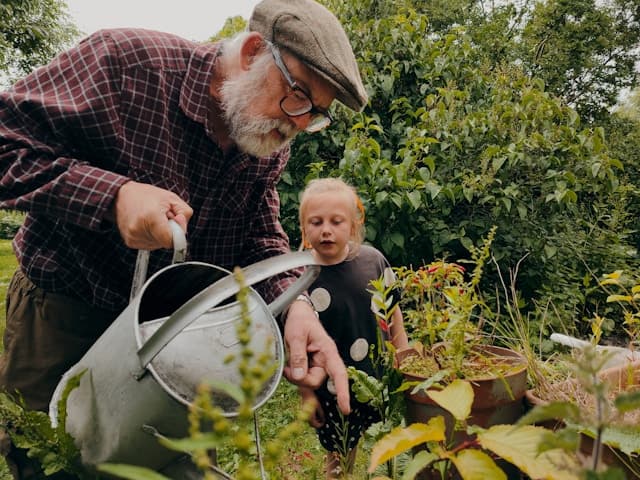 Elderly Watering Plants