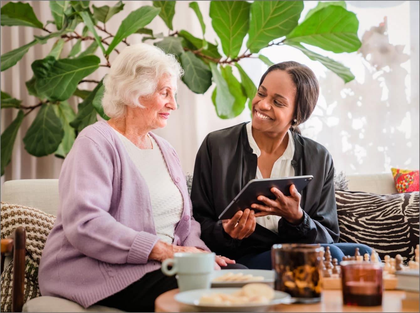Client and Care Professional on a call - Home Instead