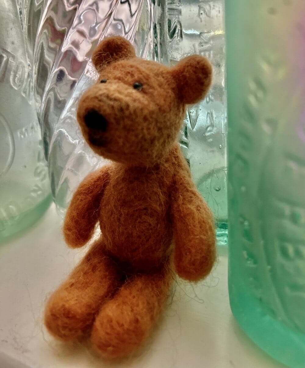 Home Instead Basingstoke picture of a small bear made by Janet by needle felting