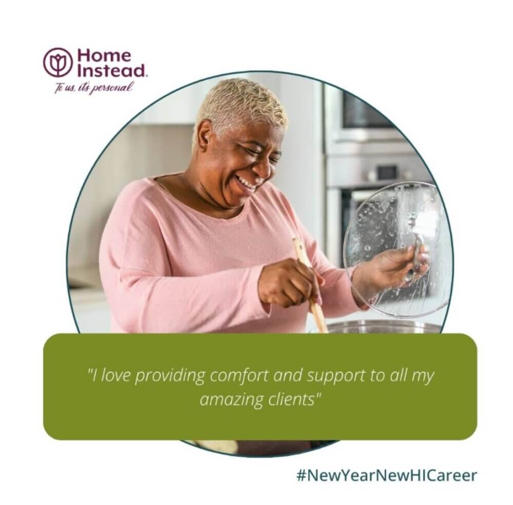 Smiling person in a kitchen, cooking and stirring with a wooden spoon. Text: "I love providing comfort and support. - Home Instead