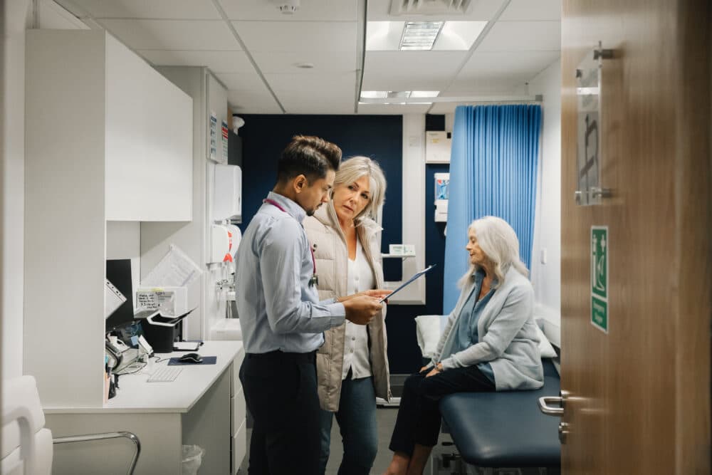 client and daughter at doctors surgery