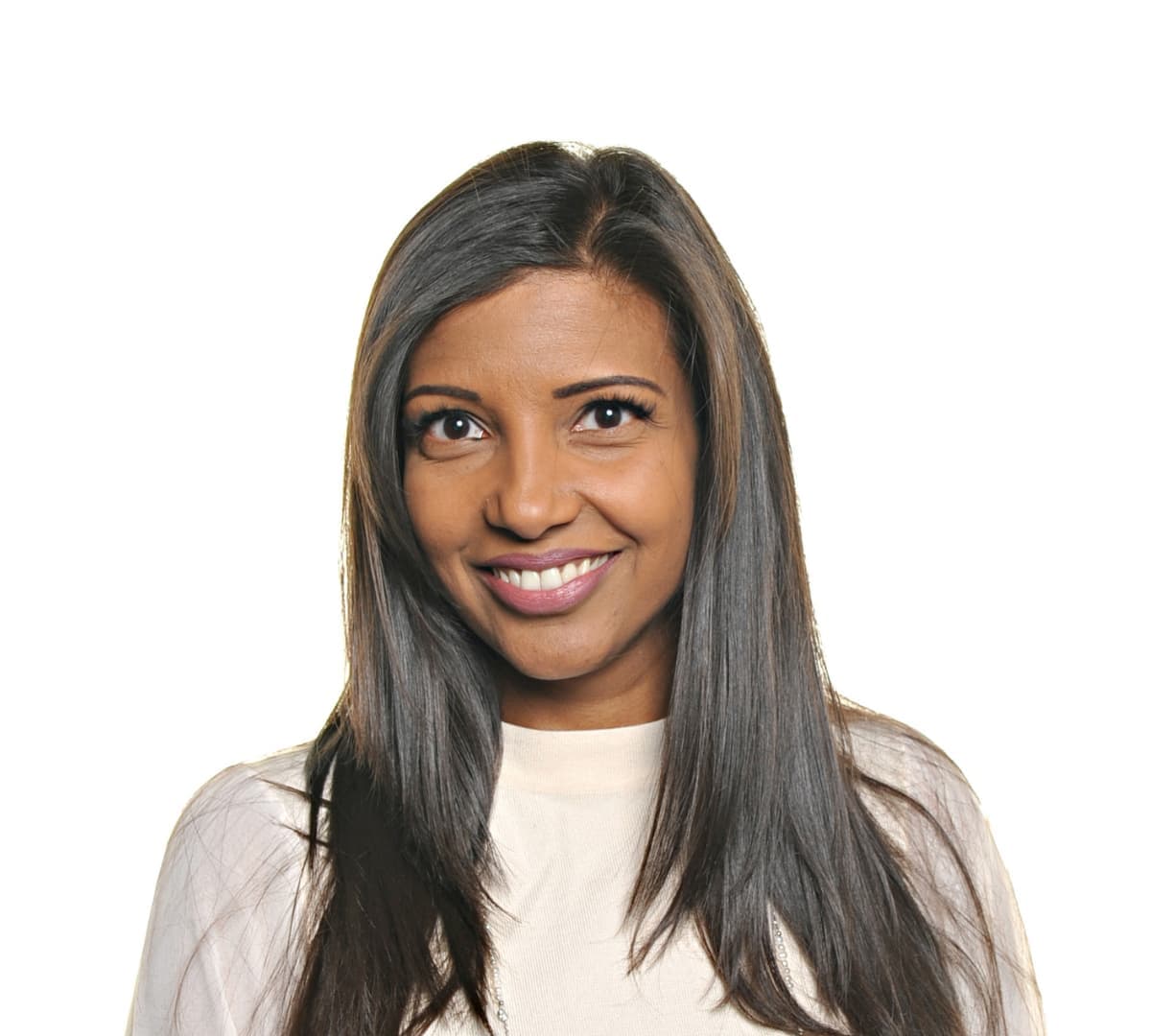 Leena with long black hair smiling beautifully