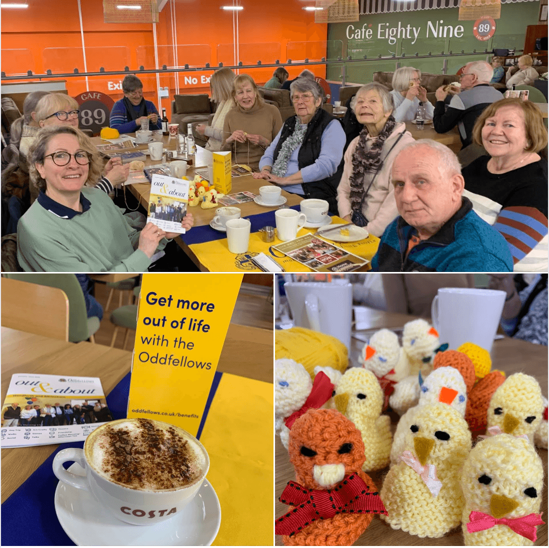 A group of smiling seniors at a café, drinks, leaflets, and knitted chicks on the table. - Home Instead