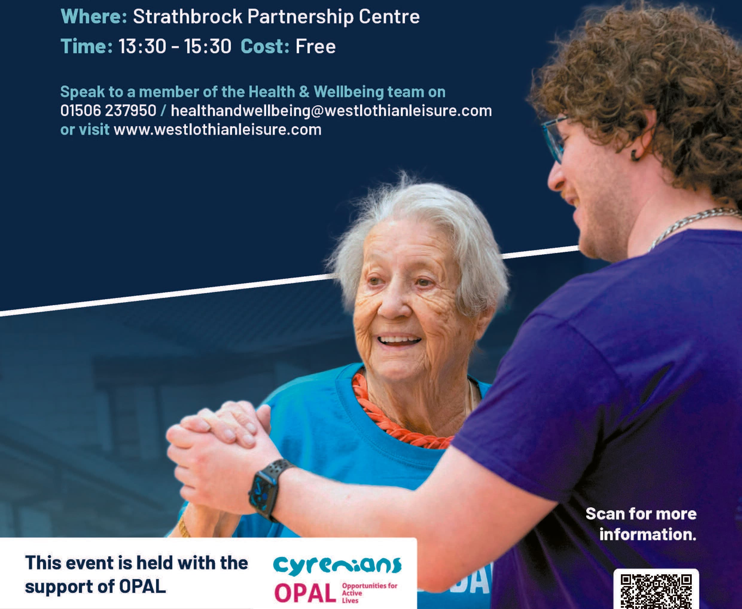 A young man assists an elderly woman, both smiling, at a community health and wellbeing event. - Home Instead