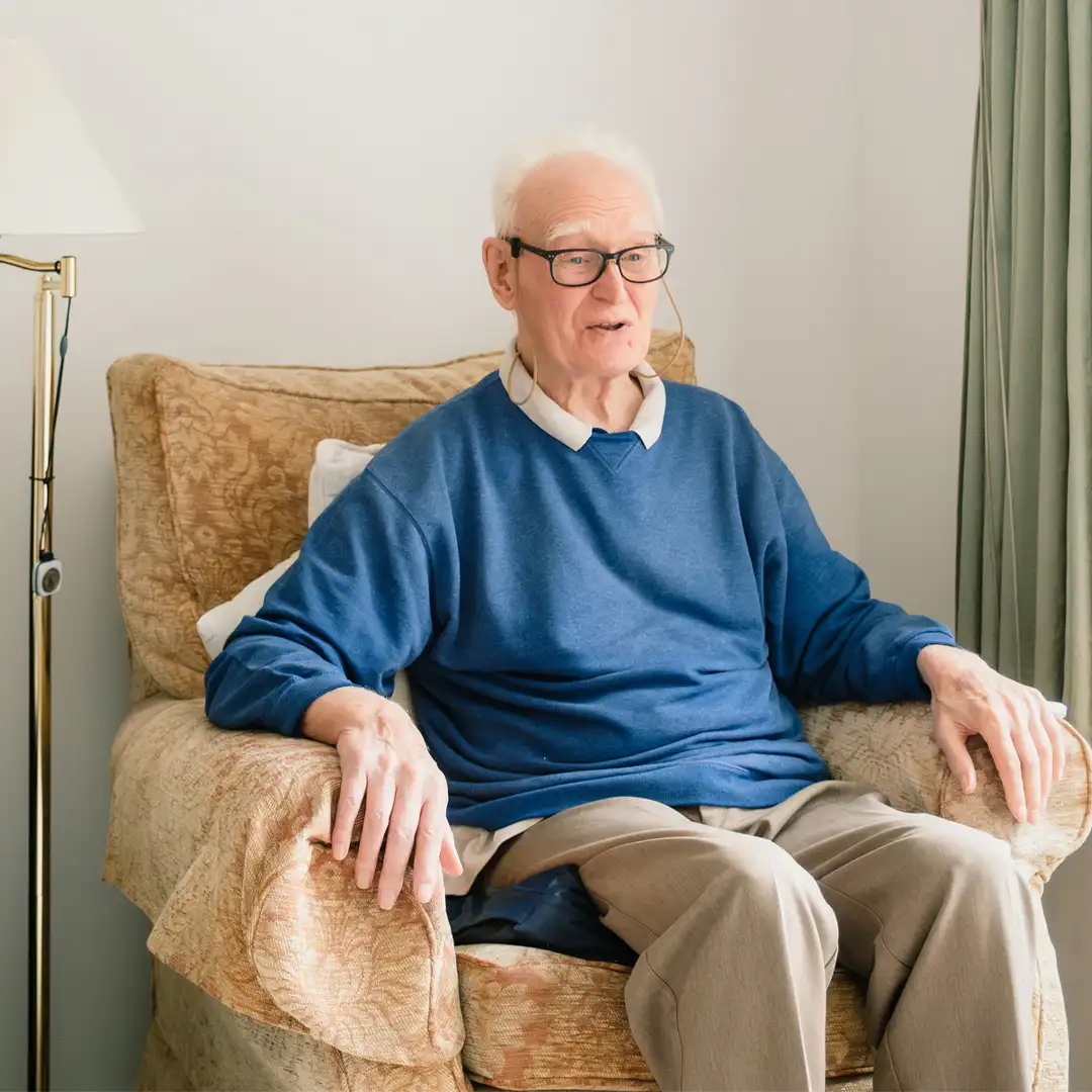 Home Instead Farnborough client Don L. sitting at home