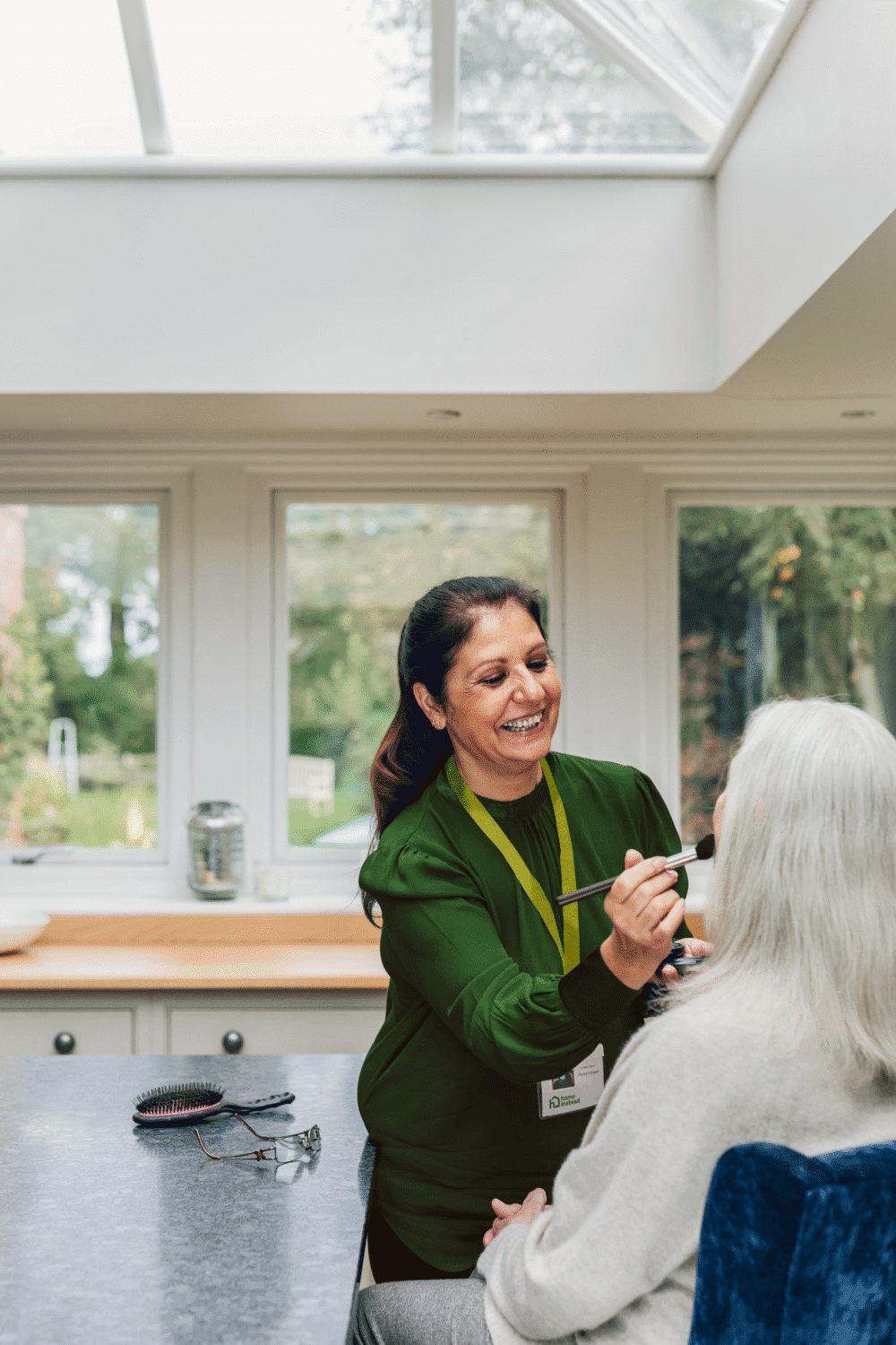 Client having makeup done by Care Professional - Home Instead