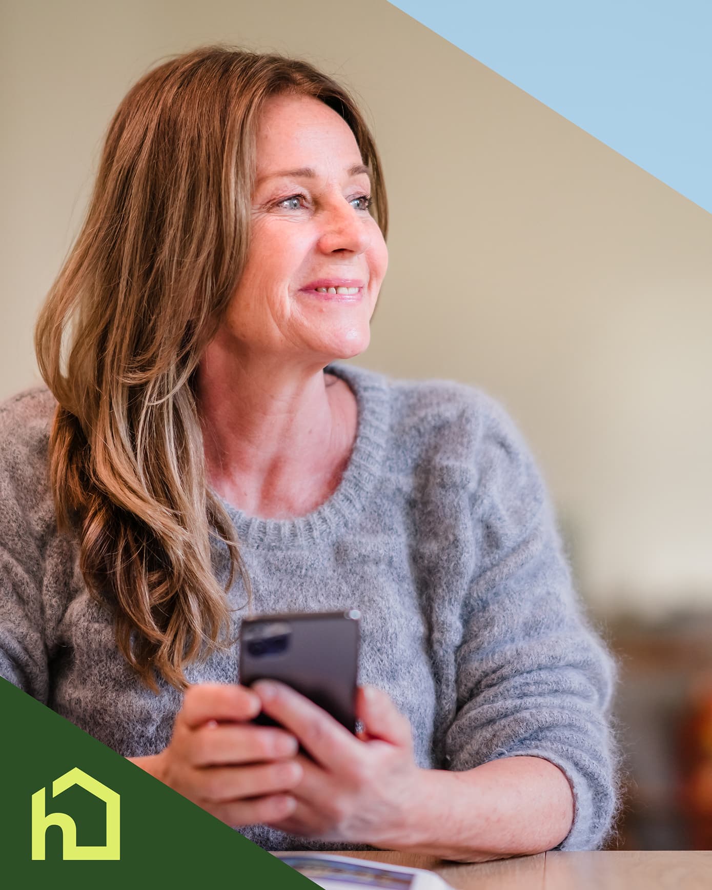 Woman sitting thoughtfully with a cup of tea while considering care options for a loved one