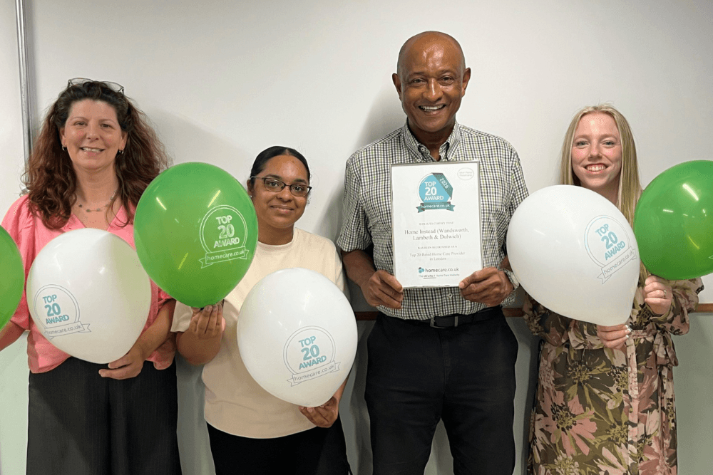 Homeinstead wandsworth director and team with award top 20 home care award